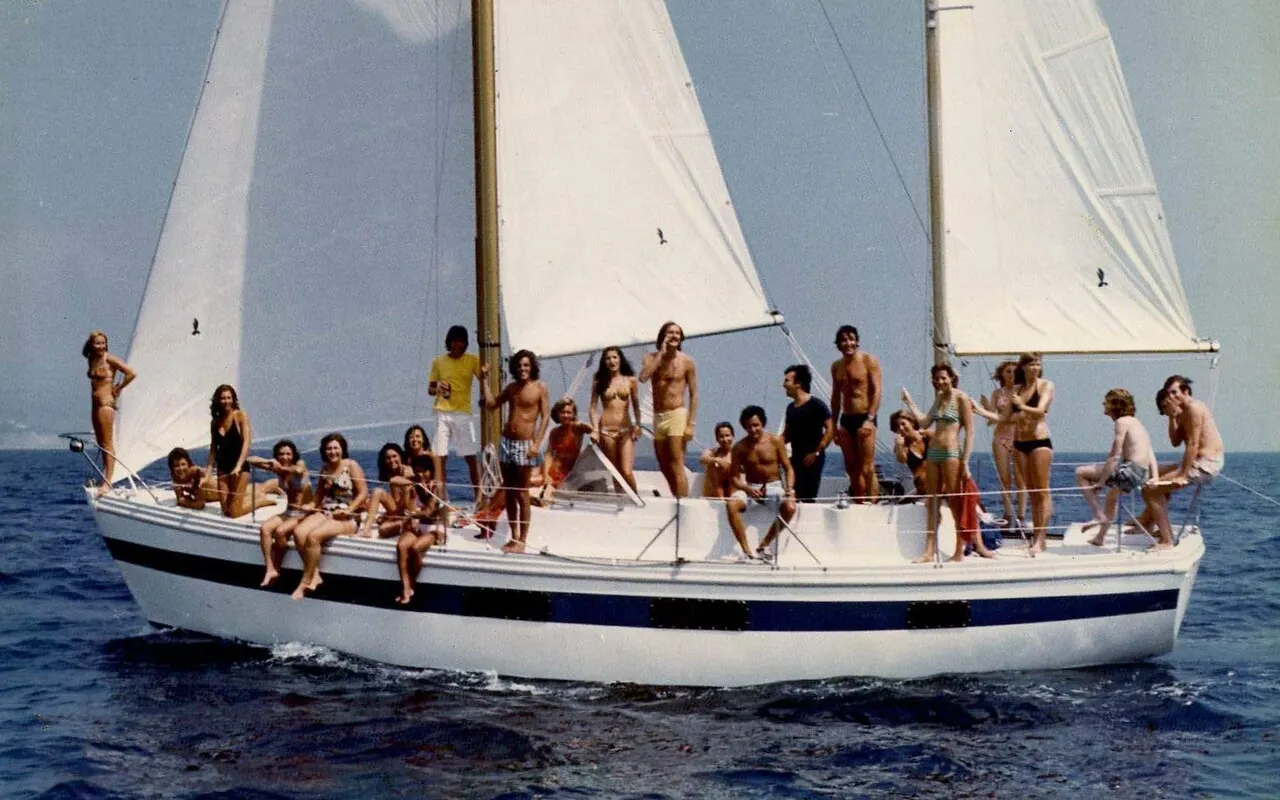 A ketch-rigged cruising yacht sailing with mainsail, mizzen and genoa set