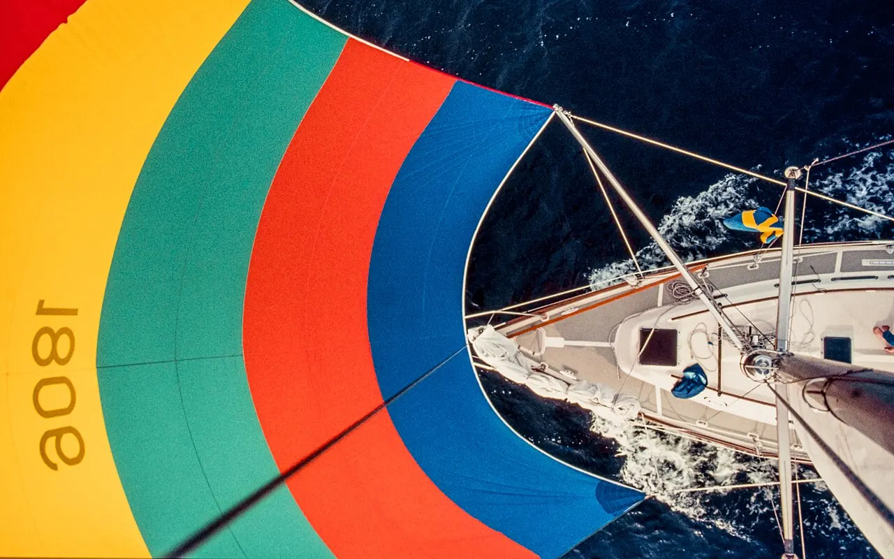 Looking down from the masthead of a yacht sailing under spinnaker