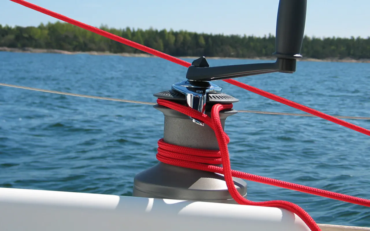 A sheet wrapped round a winch with the handle fitted
