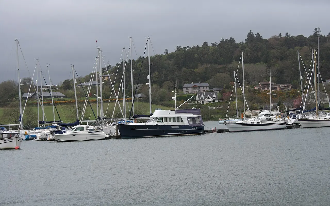 Sailing yachts moored in a marina alongside pontoons