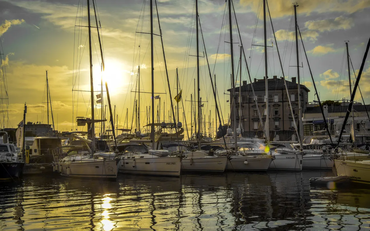 Rows of yacht masts at sunset in a marina at Zadar, Croatia
