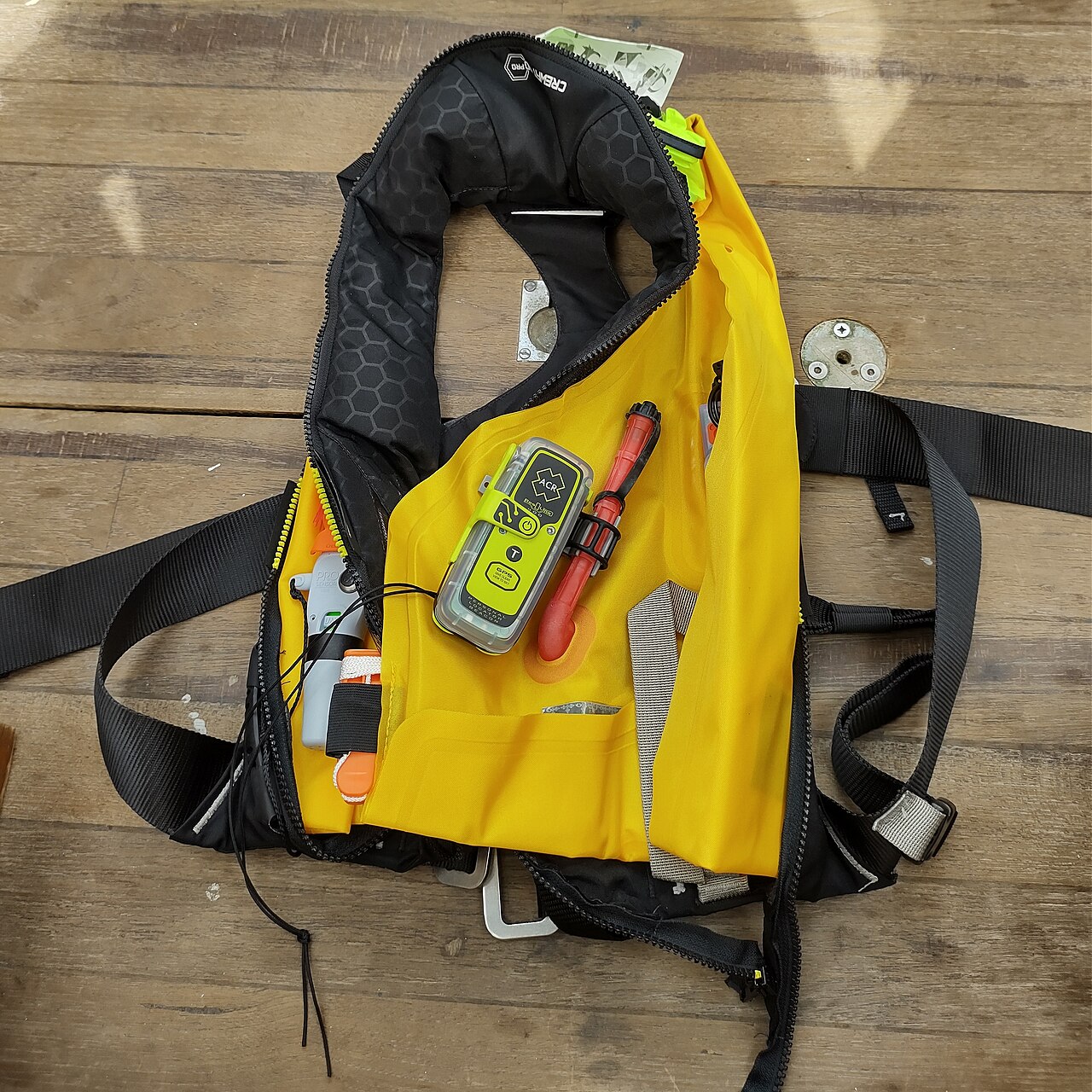A lifejacket with a PLB fitted inside