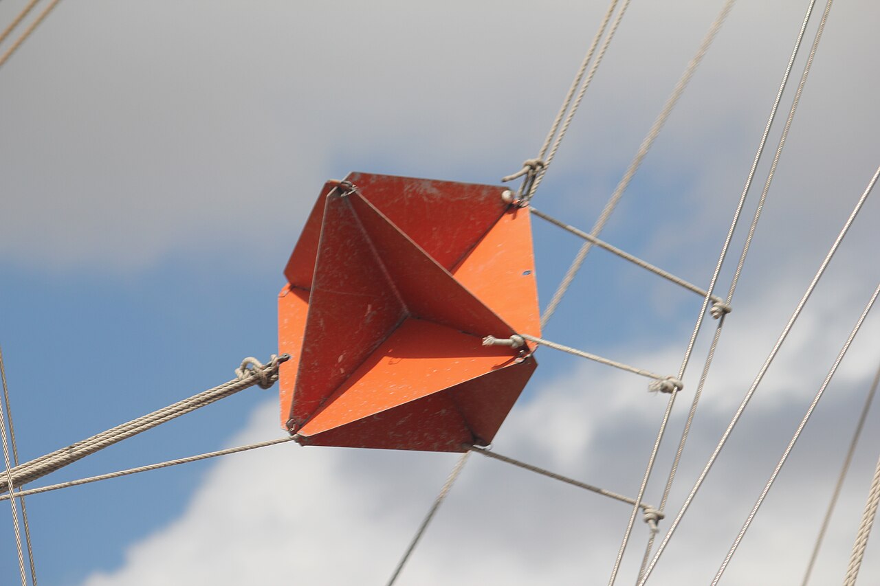 An octahedral radar reflector hung in a yacht's rigging