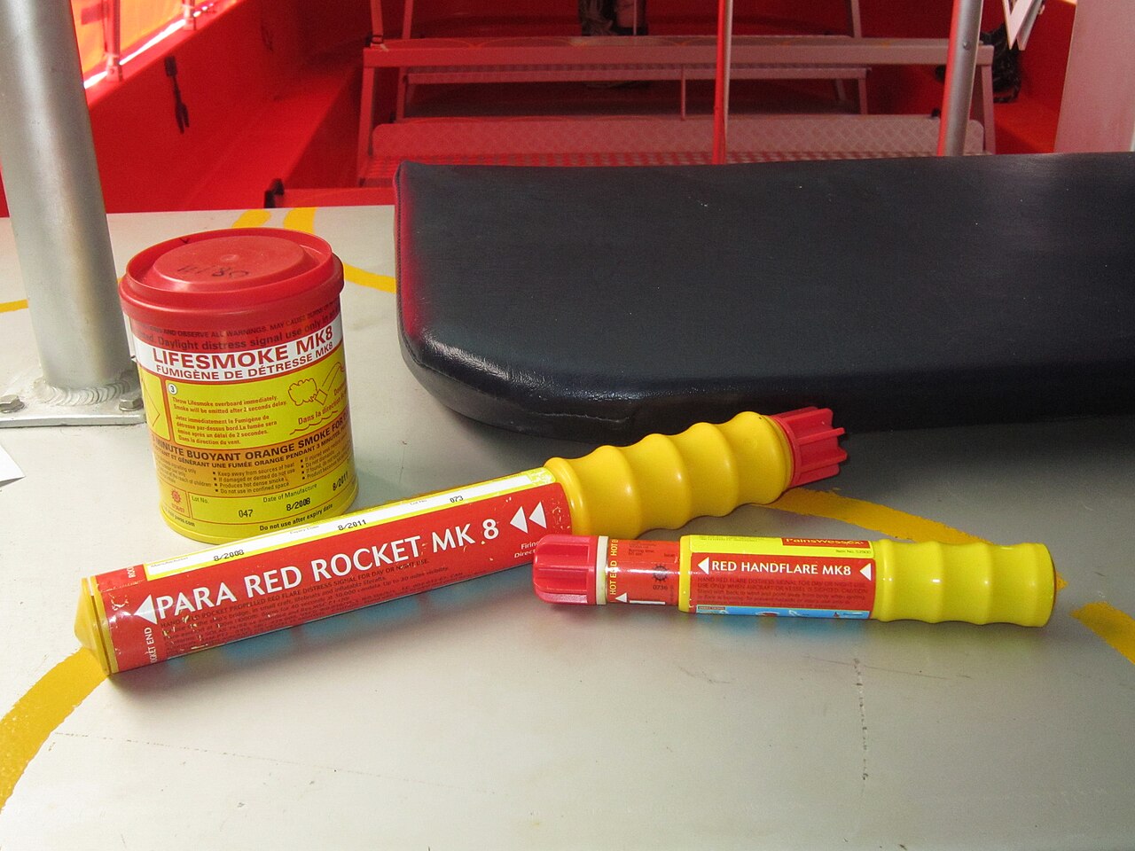 Handheld flare, orange smoke and parachute rocket flare